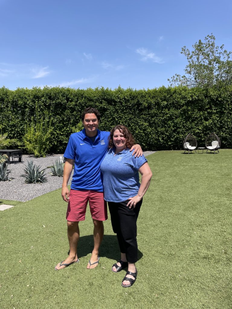 AJ Maestas and Lorien Parry Luehrs in AJ's backyard in Scottsdale, AZ after wrapping up recording the Navigating Sports Business Podcast.